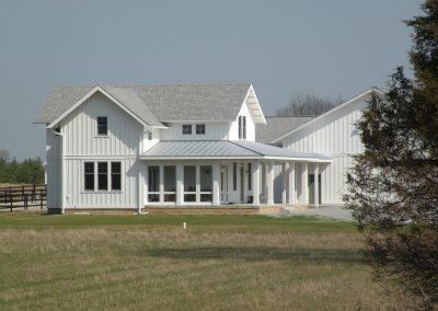 exterior of white farm house