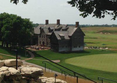 exterior shot of a cottage style golf club house