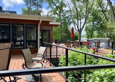 large wrap around deck of a modern house