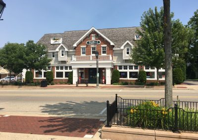 exterior of DayBreak, a gas station redesigned to have brick and paneled siding
