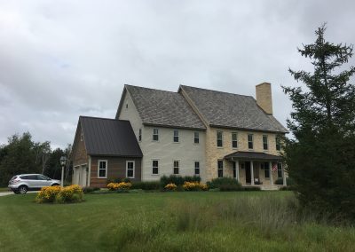 exterior and front shot of a colonial style house
