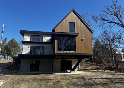 Exterior shot of three floor modern home
