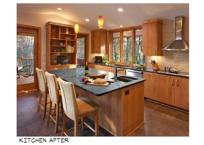 interior wooden and dark kitchen with stainless steel appliances