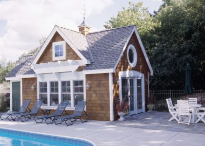 small pool-side cottage