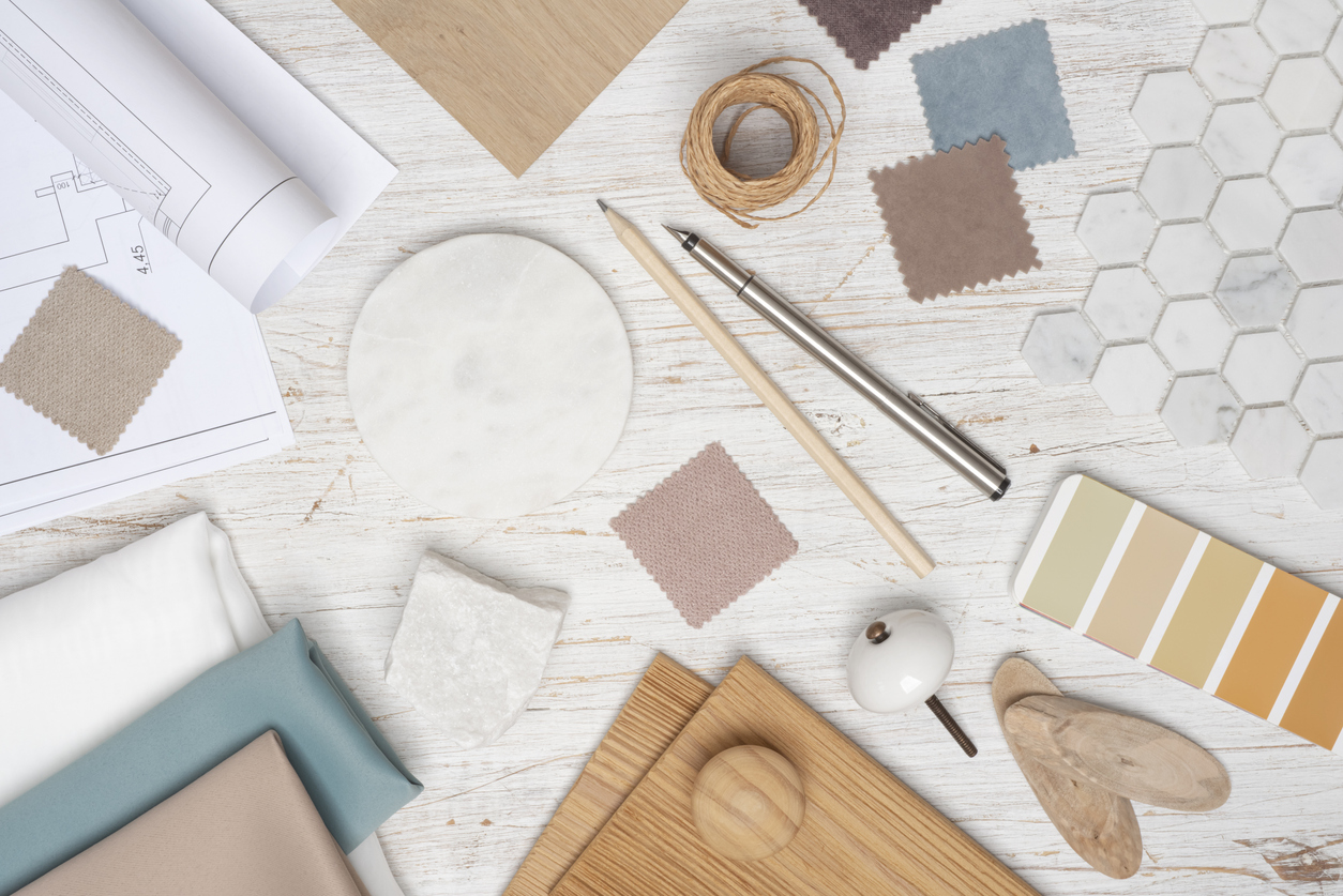 Creative table top view of furniture or interior designer with various samples and tools